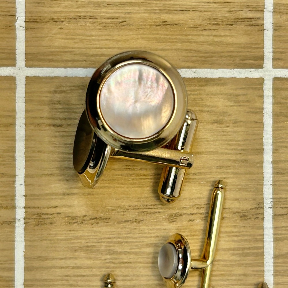 Vintage Hickok cufflinks and tuxedo studs.